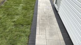 Paver pathway around side of home