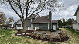 Backyard paver patio with firepit