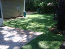 Stone patio with fresh Zoysia sod