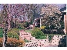 Brick walk, retaining walls and plantings in Tower Lakes area